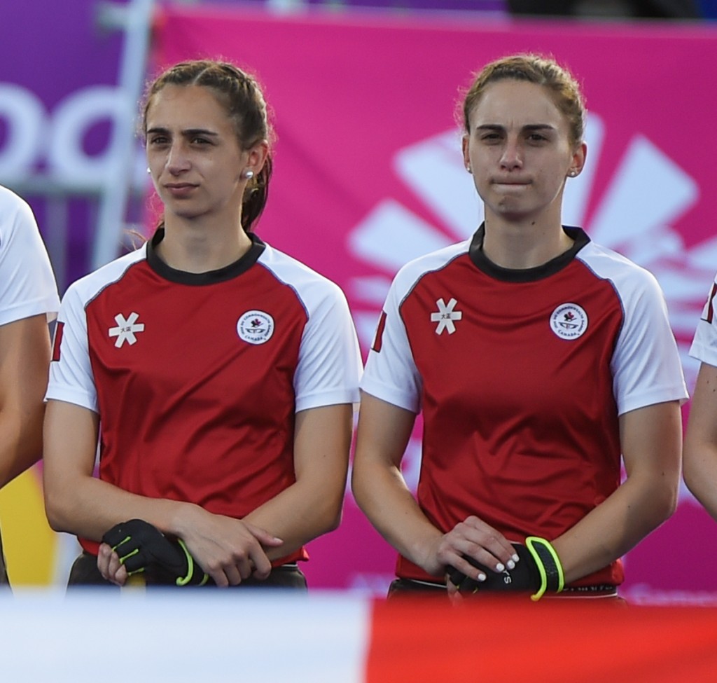 Nikki (left) and Amanda Woodcroft stand side-by-side before a match at the 2018 Commonwealth Games. Photo/Yan Huckendubler
